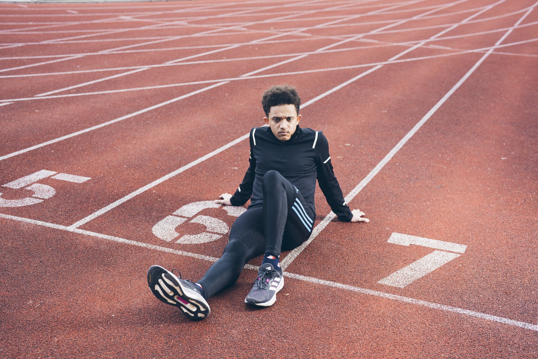 Sprinter sitting on track