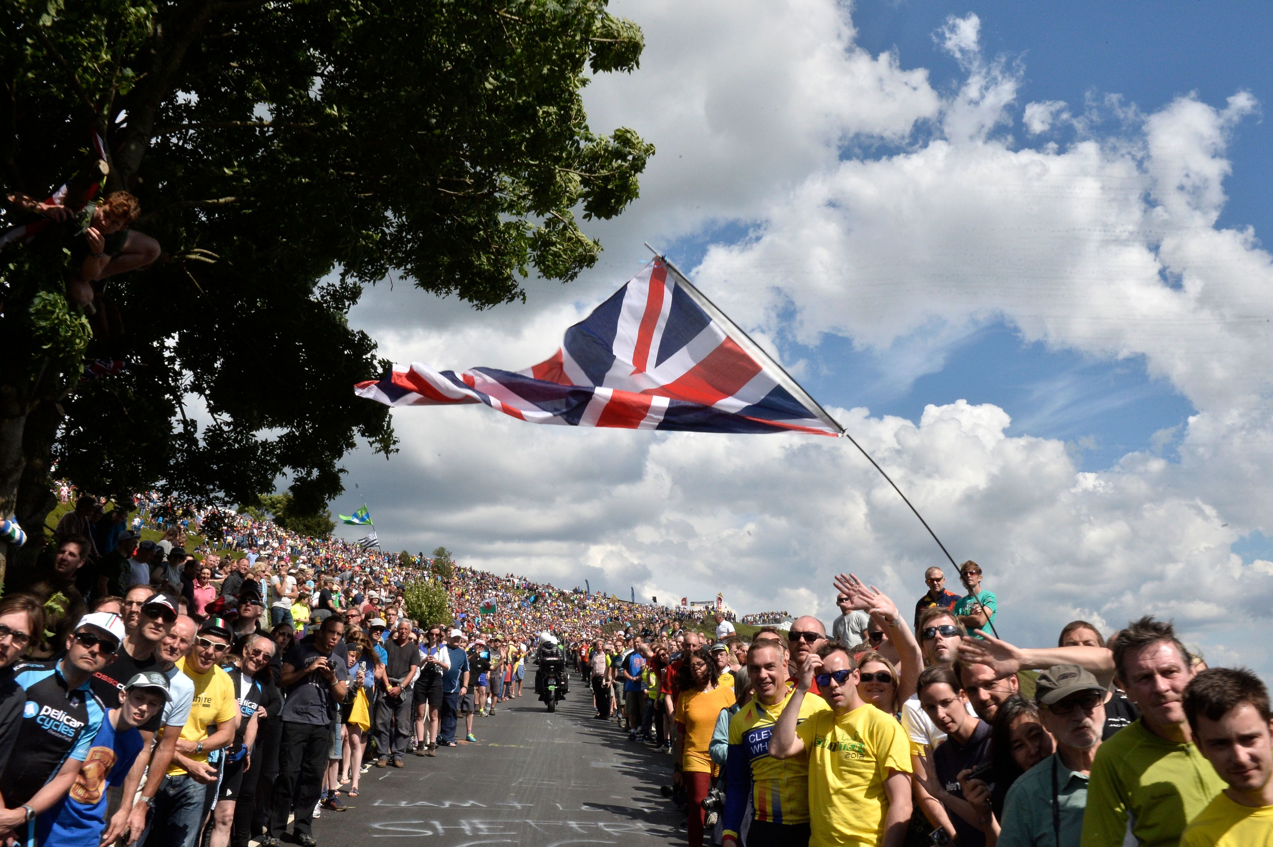 Crowds line the streets as the Tour de France departs from Yorkshire, England in 2015.